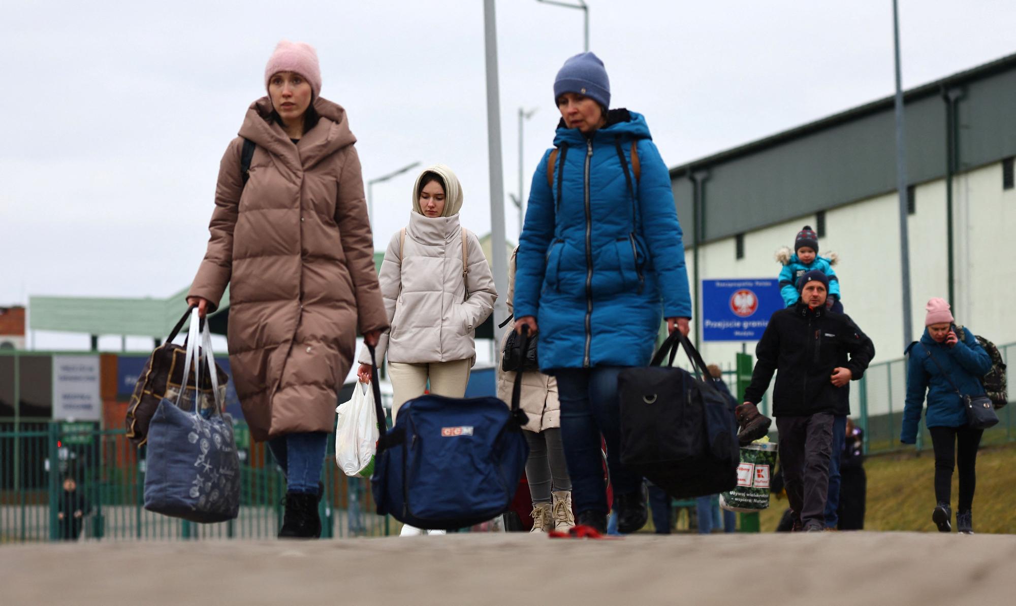 Refugiados ucranianos en la frontera con Polonia.