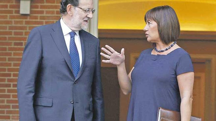 Imagen de una reunión entre Rajoy y Armengol. Ahora se volverán a ver en los tribunales.