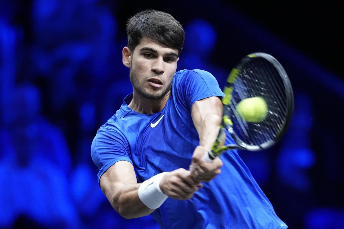 Team Europe's Carlos Alcaraz returns to Team World's Taylor Fritz on the third day of the Laver Cup tennis tournament, at the Uber arena in Berlin, Germany, Sunday, Sept. 22, 2024. (AP Photo/Ebrahim Noroozi)