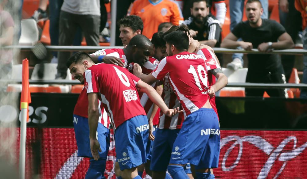 El partido entre el Valencia y el Sporting, en imágenes