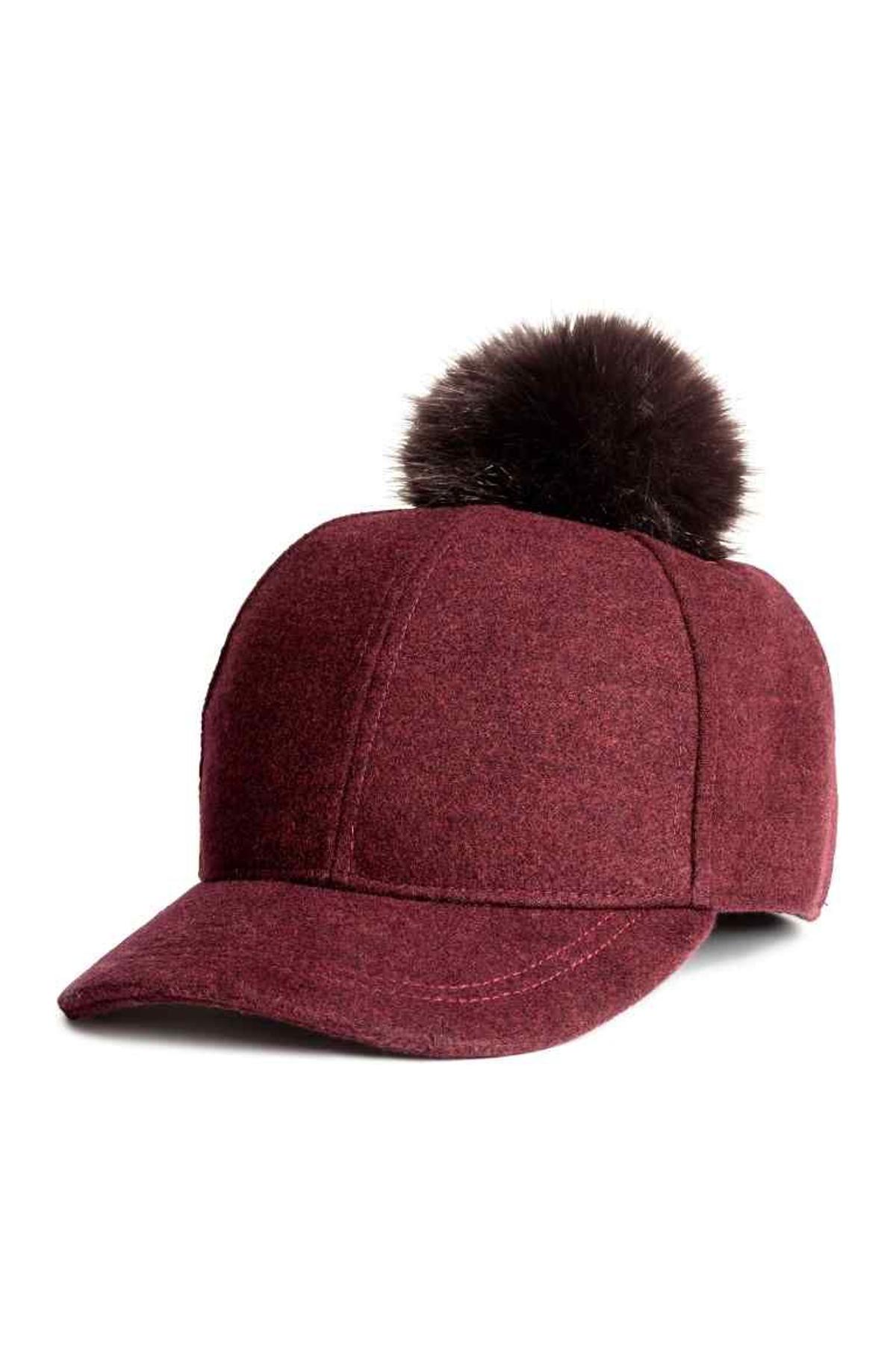 Gorra con pompón de H&amp;M (Precio 12,99 euros)