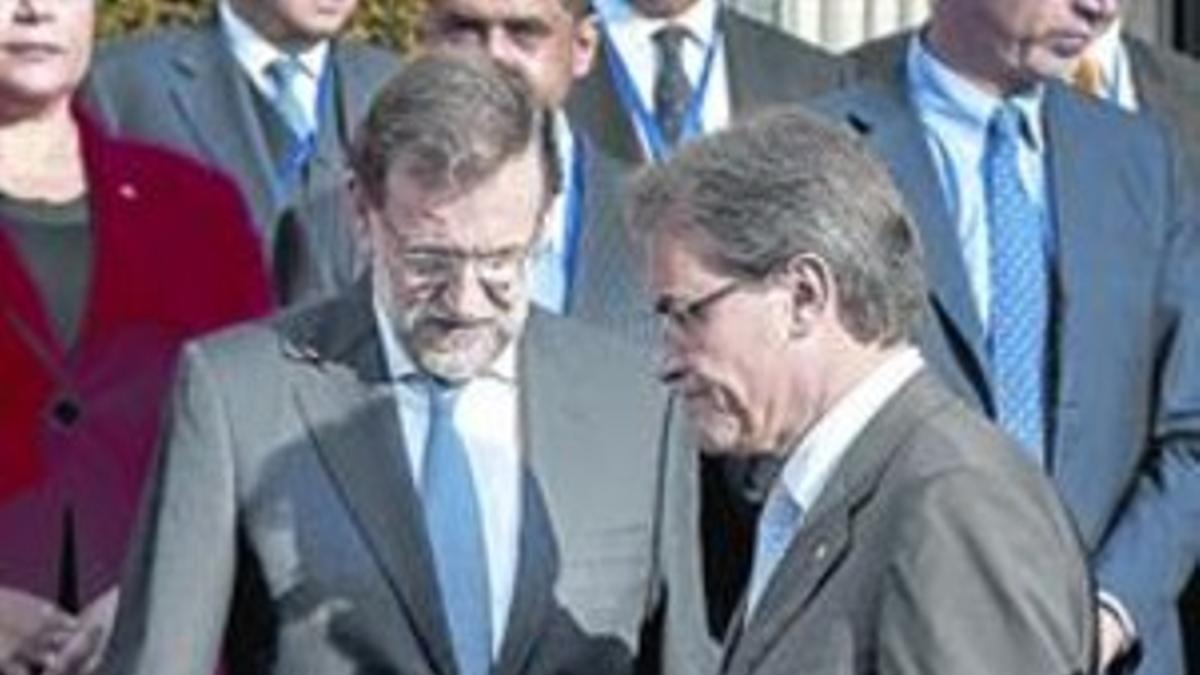 Rajoy con Mas, en el último encuentro en el que coincidieron para poco más de una foto en Barcelona.