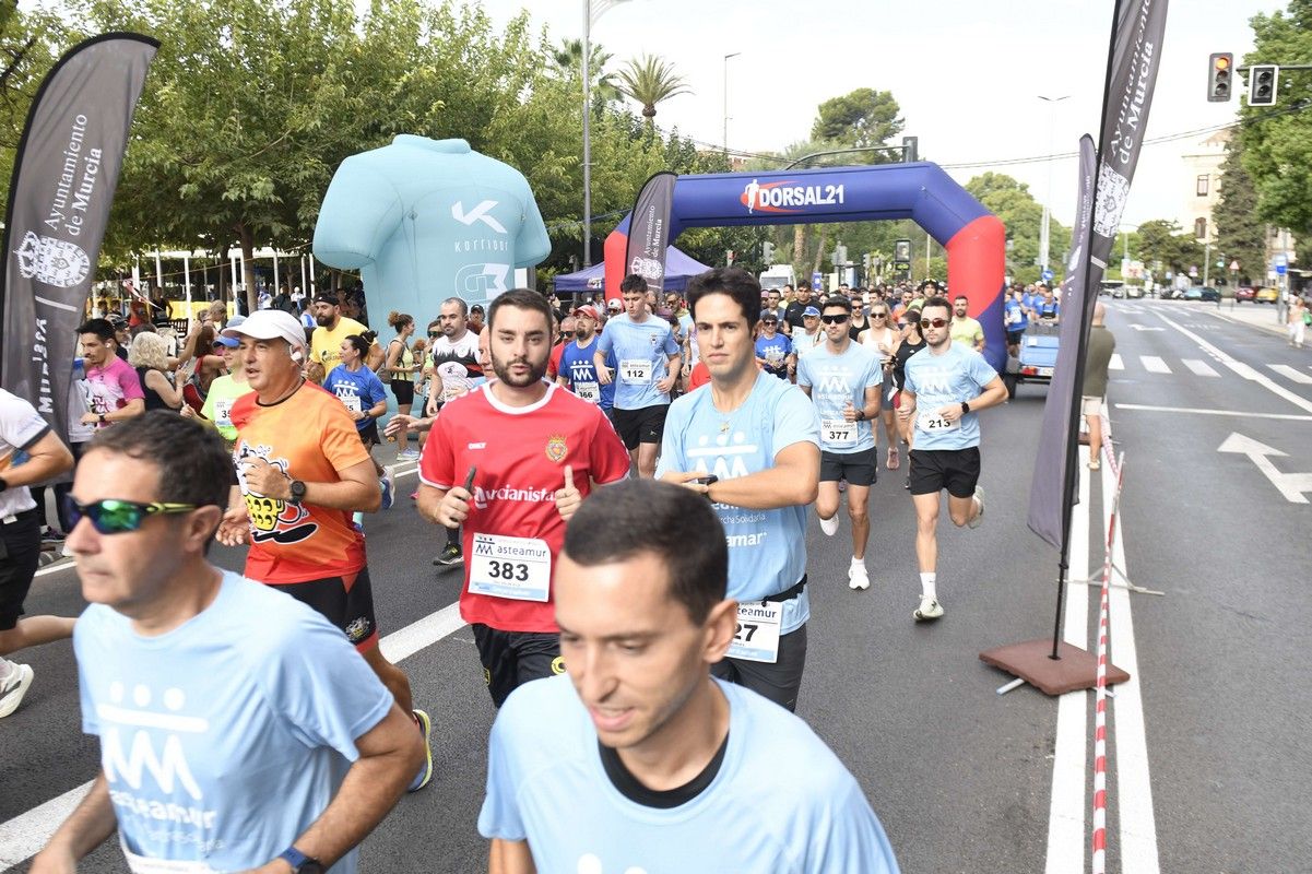 La carrera y marcha Solidaria Asteamur, en imágenes