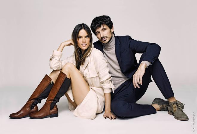 Alessandra Ambrosio con botas altas y Andrés Velencoso con zapatos, ambos de Xti