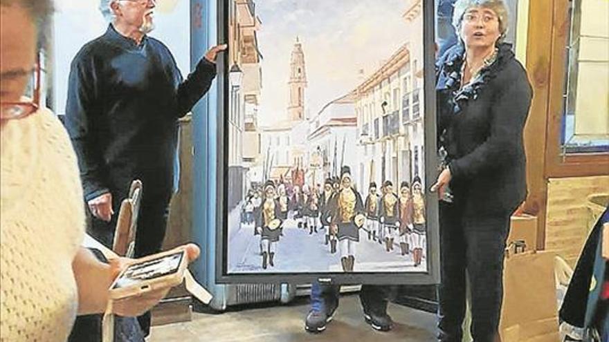antonio solórzano dona un cuadro al centro ocupacional de promi