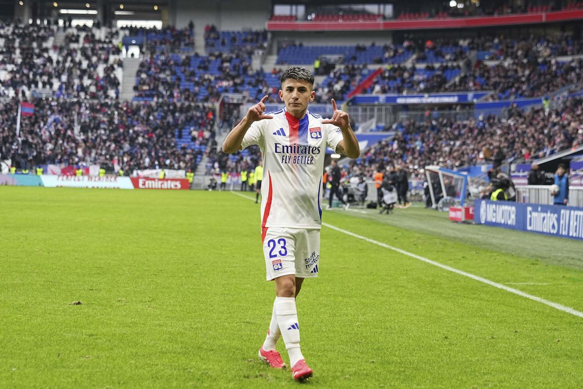 Lyon's Thiago Almada gestures during the French League One soccer match between Lyon and Reims at the Groupama stadium in Decines, outside Lyon, central France, Sunday, Feb. 9, 2025. (AP Photo/Laurent Cipriani)