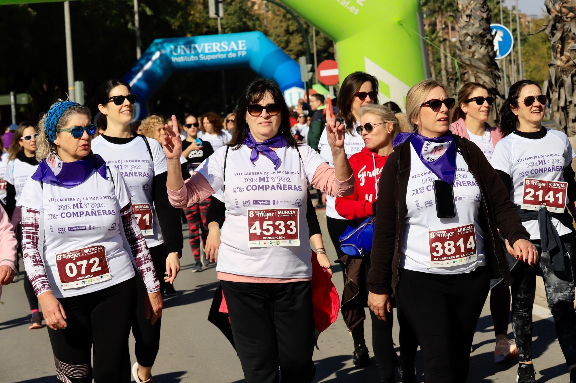 La salida y el recorrido de la Carrera de la Mujer 'inmortalizados' en imágenes