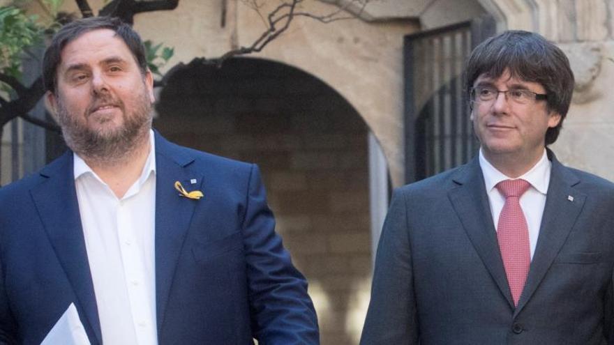 Carles Puigdemont y Oriol Junqueras.