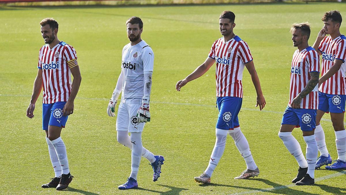 Juanpe, entre Ortolá i Aleix abans de jugar ambl’Espanyol B
