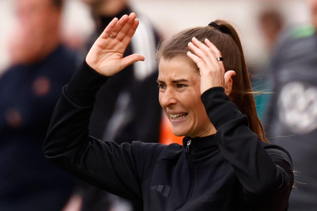Union Berlin's German head coach Marie-Louise Eta reacts from the sidelines during the German first division Bundesliga football match between Union Berlin and VfL Wolfsburg in Berlin, Germany, on April 18, 2026. (Photo by Odd ANDERSEN / AFP) / DFL REGULATIONS PROHIBIT ANY USE OF PHOTOGRAPHS AS IMAGE SEQUENCES AND/OR QUASI-VIDEO. DFL REGULATIONS PROHIBIT ANY USE OF PHOTOGRAPHS AS IMAGE SEQUENCES AND/OR QUASI-VIDEO