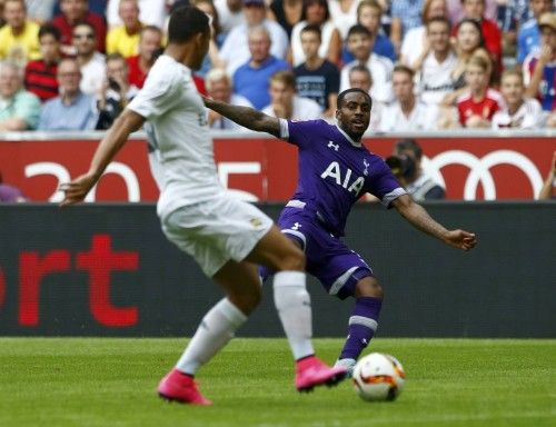 Real Madrid's Danilo fights for the ball with Tottenham Hotspur's Rose during their pre-season Audi Cup tournament soccer match in Munich