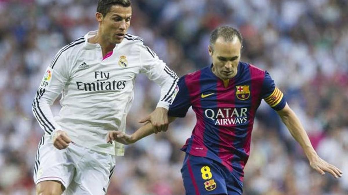 Cristiano Ronaldo y Andrés Iniesta durante el Real Madrid - Barça de la Liga BBVA 2014-15