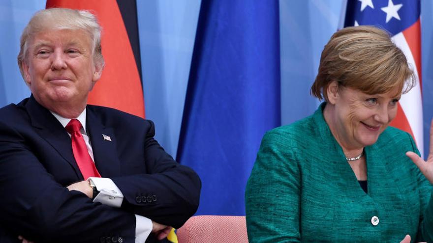 Trump y Merkel, durante un acto del G-20 este sábado.