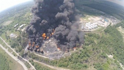 An aerial view shows a fuel depot on fire near Vasylkiv