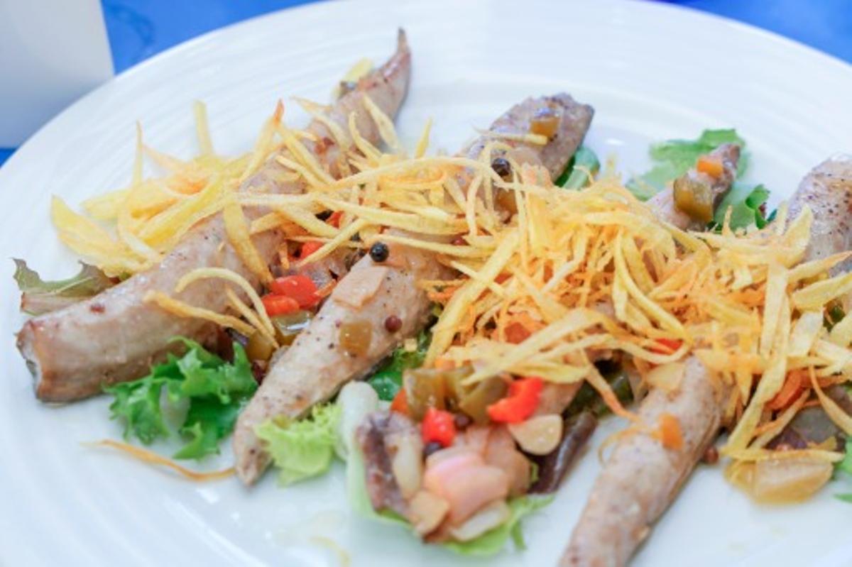 Caballa en escabeche.