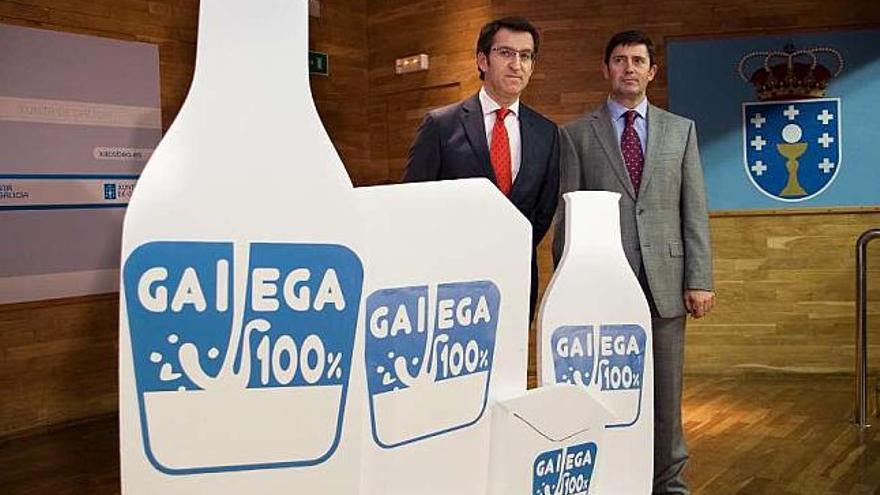Feijóo y Juárez, ayer, en la presentación de la marca de leche &#039;Galega 100%&#039;. / xoán crespo