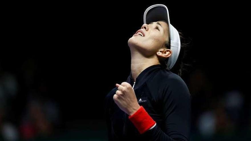 Muguruza celebra su victoria en el primer partido de Singapur.