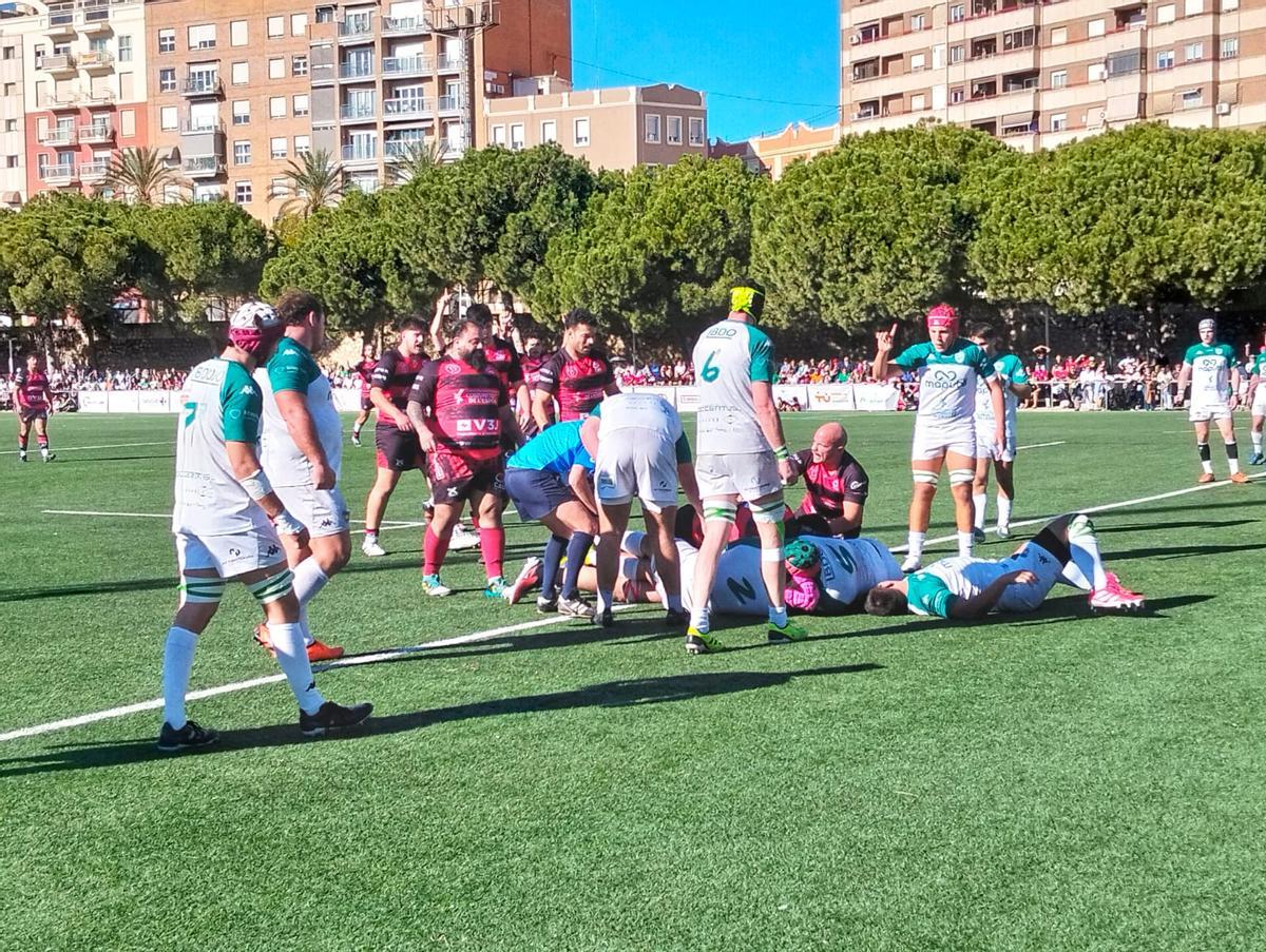 Partido entre el CAU Valencia y el Valencia RC en el campo del Río