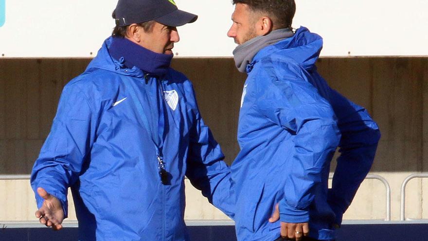 José González, junto a Demichelis, en un entrenamiento de esta semana.