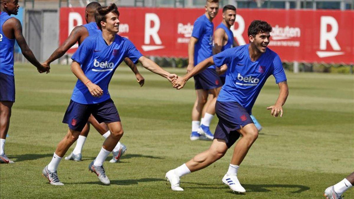 Los dos jugadores en un entrenamiento del primer equipo