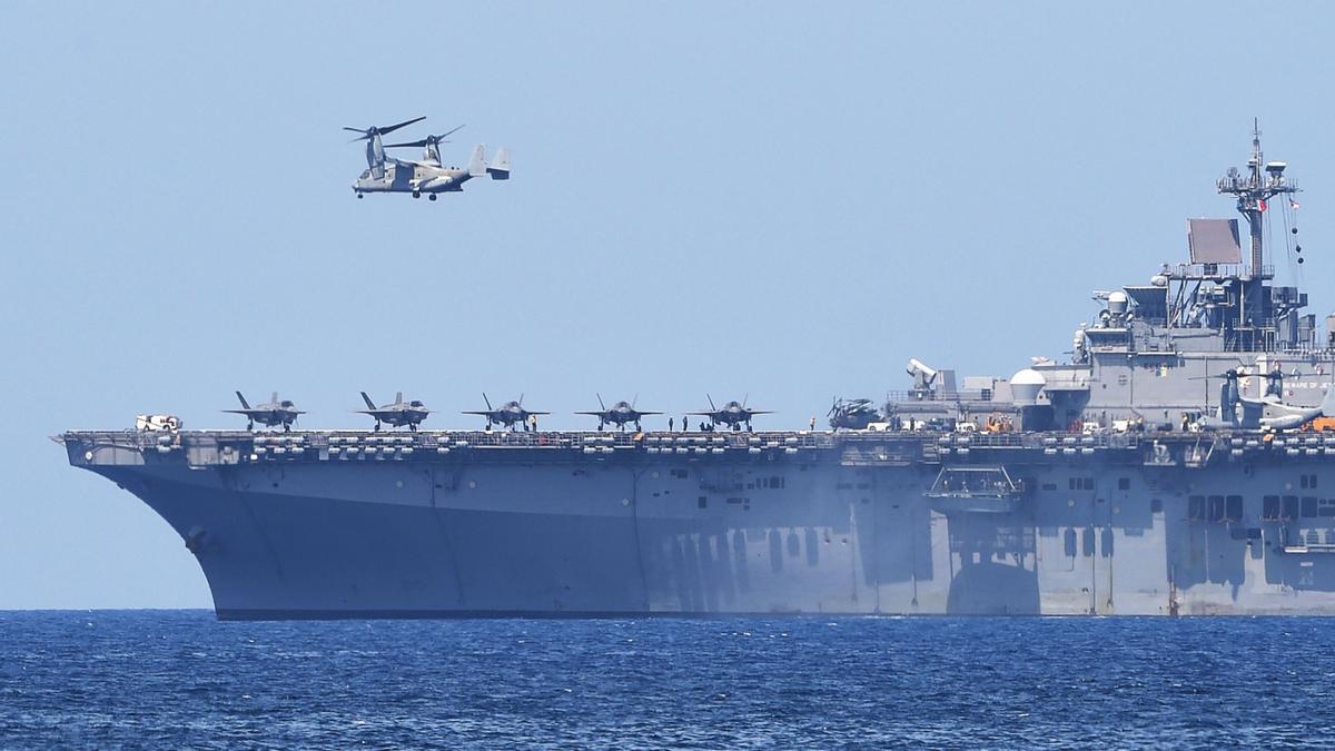 A US V-22 Osprey takes off from the USS Wasp, US Navy multipurpose amphibious assault ship, during the amphibious landing exercises as part of the annual joint US-Philippines military exercise on the shores of San Antonio town, facing the South China sea, Zambales province on April 11, 2019. (Photo by TED ALJIBE / AFP)
