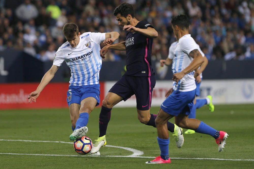 Imágenes del partido entre Málaga y Barcelona.