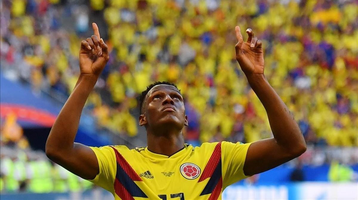 jdomenech44035888 colombia s defender yerry mina  r  celebrates after scoring 180628181021