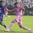 Inter Miami forward Luis Suárez, right, attempts a shot on the goal against Pumas UNAM defender Nathan Silva (6) during the first half of a Leagues Cup soccer match, Wednesday, Aug. 6, 2025, in Fort Lauderdale, Fla. (AP Photo/Lynne Sladky)