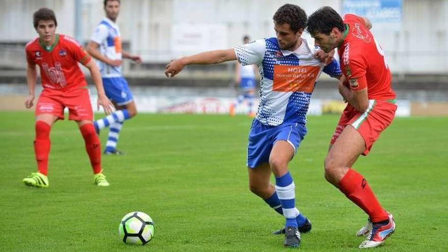 Manuti y Arturo, en un partido en Portonovo.