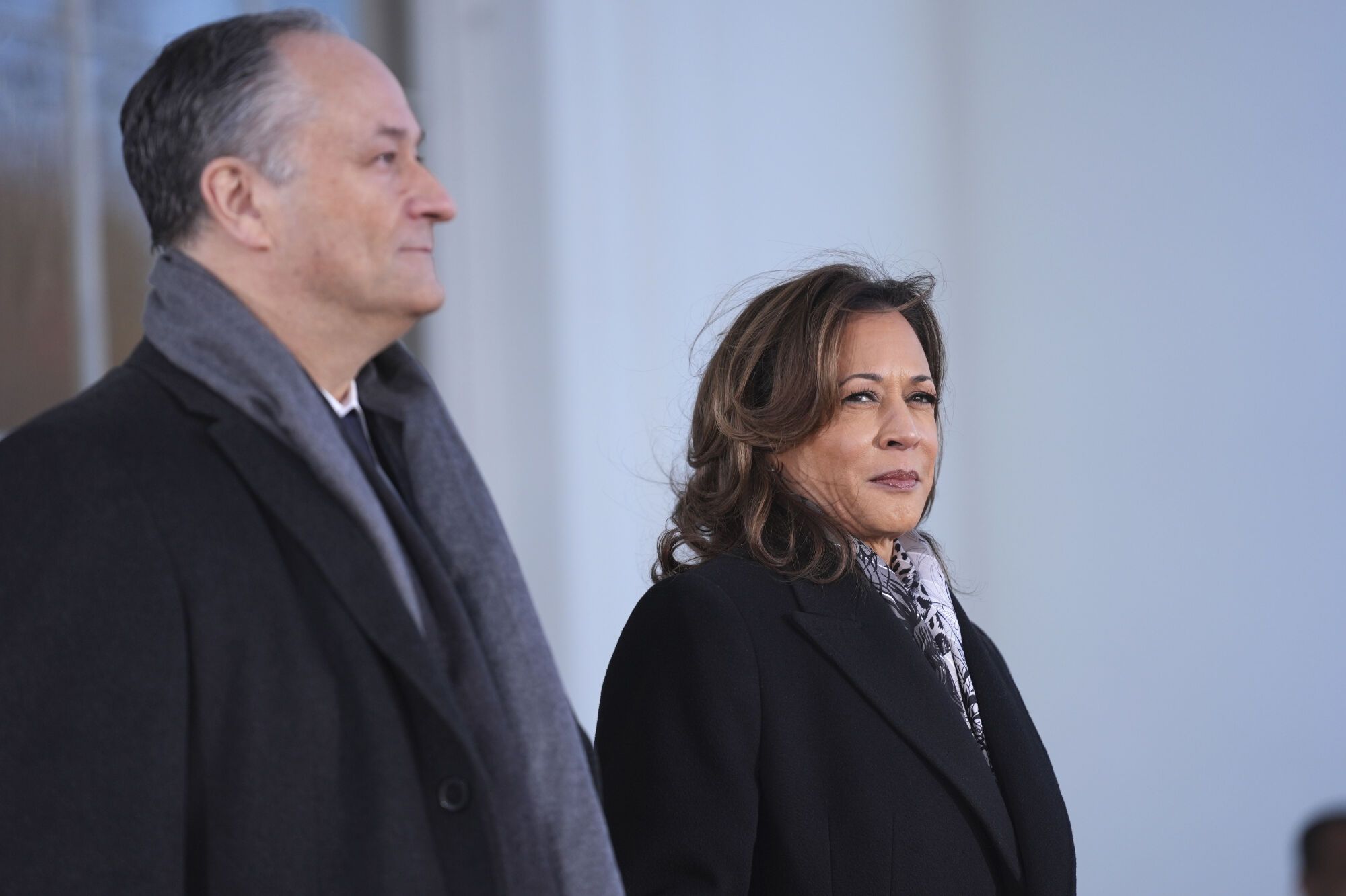 Vice President Kamala Harris, right, and second gentleman Doug Emhoff stand before greeting Vice President-elect JD Vance and Usha Vance at the White House, Monday, Jan. 20, 2025, in Washington. (AP Photo/Evan Vucci)