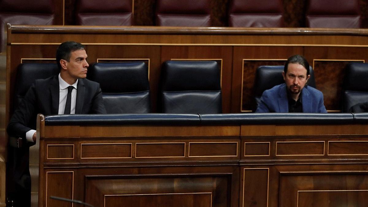 El presidente del Gobierno, Pedro Sánchez, y el vicepresidente segundo, Pablo Iglesias, en el Congreso, el pasado 27 de mayo