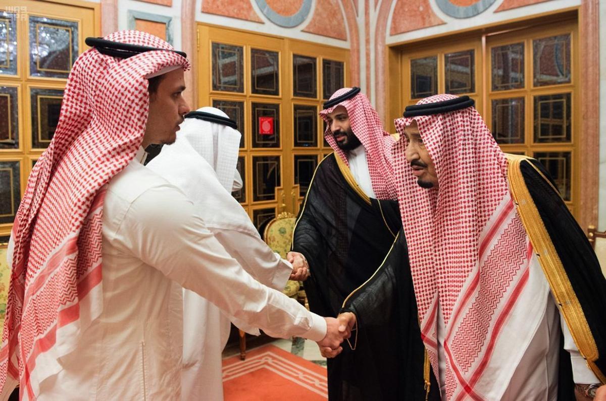 In this photo released by Saudi Press Agency  SPA  Saudi King Salman  right  and Crown Prince Mohammed bin Salman  second right  receive Sahel  a family member  and Salah  a son  of Jamal Khashoggi  in Riyadh  Saudi Arabia  Tuesday  Oct  23  2018  Saudi Arabia  which for weeks maintained that Jamal Khashoggi had left the Istanbul consulate  on Saturday acknowledged he was killed there in a  fistfight    Saudi Press Agency via AP