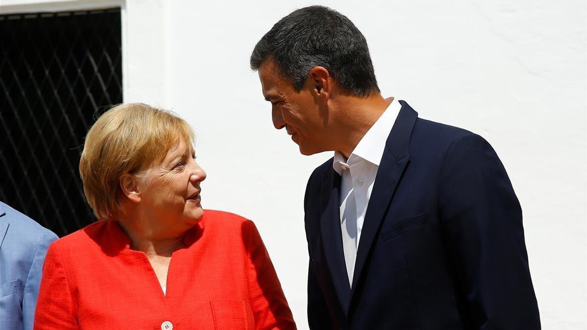 Angela Merkel y Pedro Sánchez, este sábado, antes de comenzar su desayuno de trabajo.