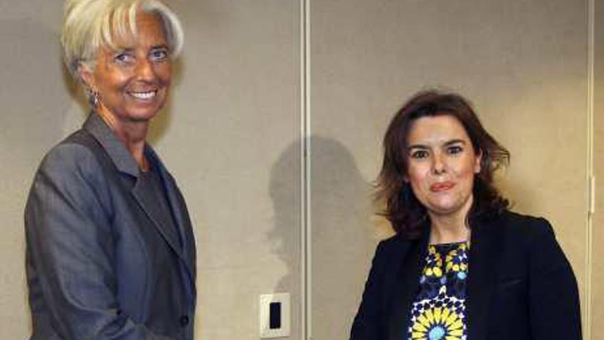 Lagarde y Santamaría en su  encuentro en Washington.