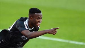 Real Madrid s Brazilian forward Vinicius Junior celebrates after scoring a goal during the Spanish League football match between Sevilla and Real Madrid at the Sanchez Pizjuan stadium in Seville on December 5  2020  (Photo by CRISTINA QUICLER   AFP)