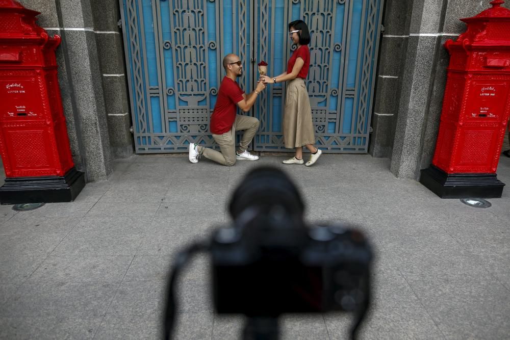 A couple take a selfie during a Valentine's Day ...