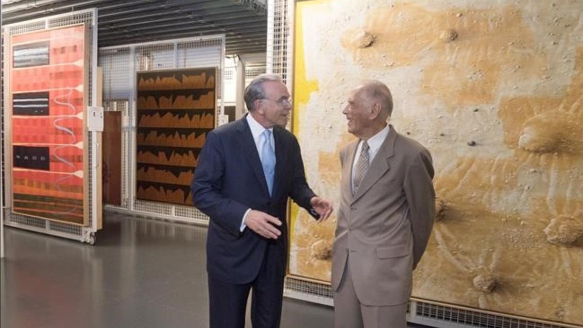 Isidre Fainé, presidente de la Fundació Bancària La Caixa, y Josep Vilarasau, impulsor de la colección de arte contemporáneo de la institución.