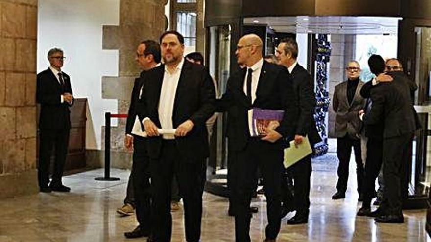 Oriol Junqueras, Raül Romeva, Quim Forn i Josep Rull a l&#039;entrada del Parlament, el 28 de gener