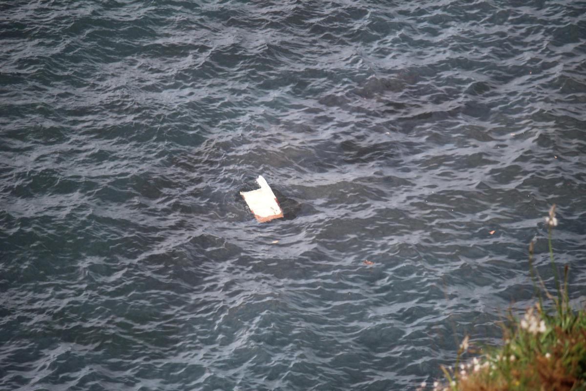 En imágenes: intenso operativo de búsqueda en la costa de El Franco para dar con un pescador francés