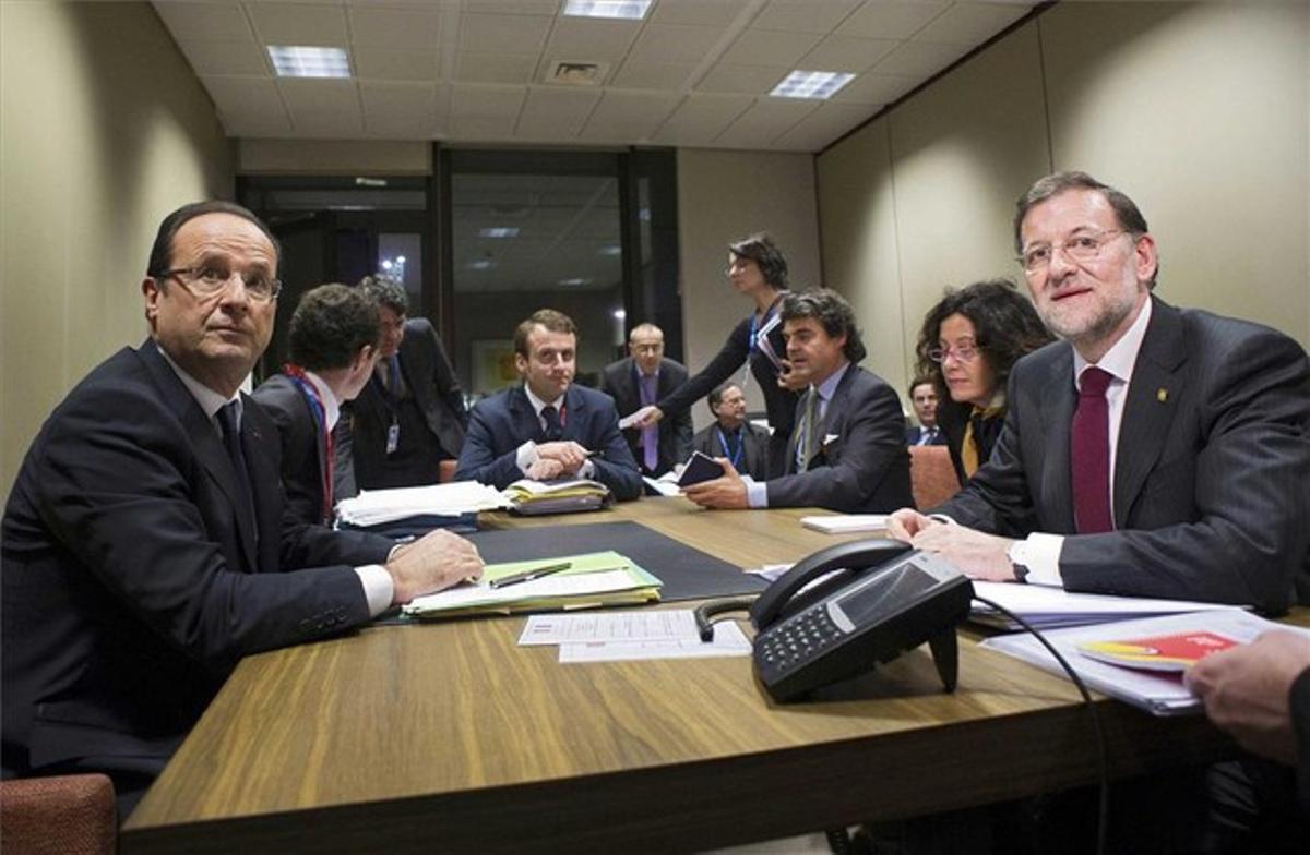 Hollande i Rajoy, en la trobada bilateral prèvia a la cimera europea.
