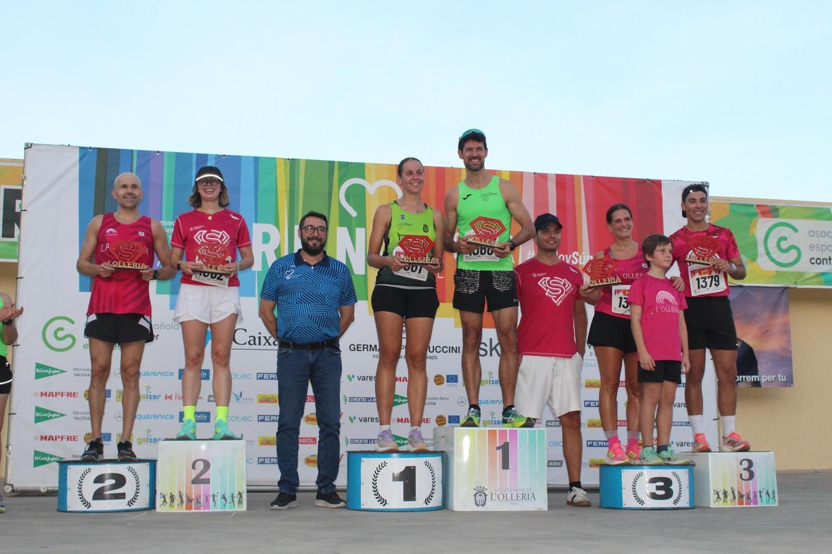 Podio con los ganadores de la carrera Runcàncer 2025 de l'Olleria.