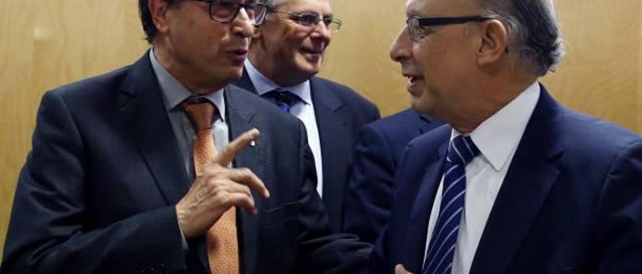 El conseller Vicent Soler, en un acto con el ministro de Hacienda, Cristóbal Montoro.