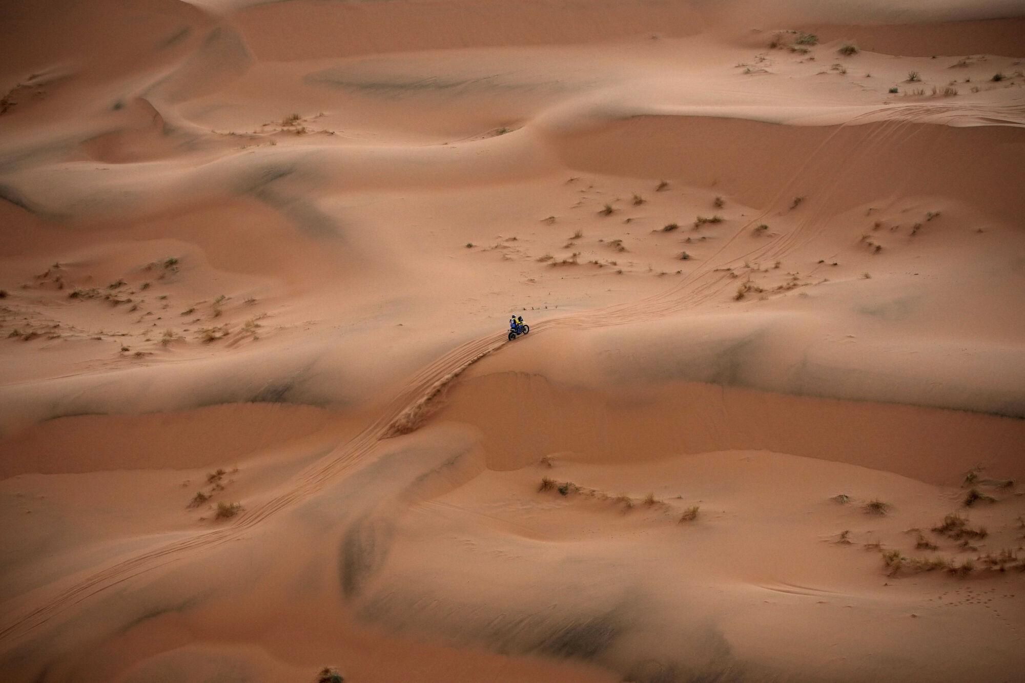 Milan Engel rides on the sand dunes during the seventh stage of the Dakar Rally with start and finish in Al Duwadimi, Saudi Arabia, Sunday, Jan. 12, 2025. (AP Photo/Christophe Ena). EDITORIAL USE ONLY/ONLY ITALY AND SPAIN