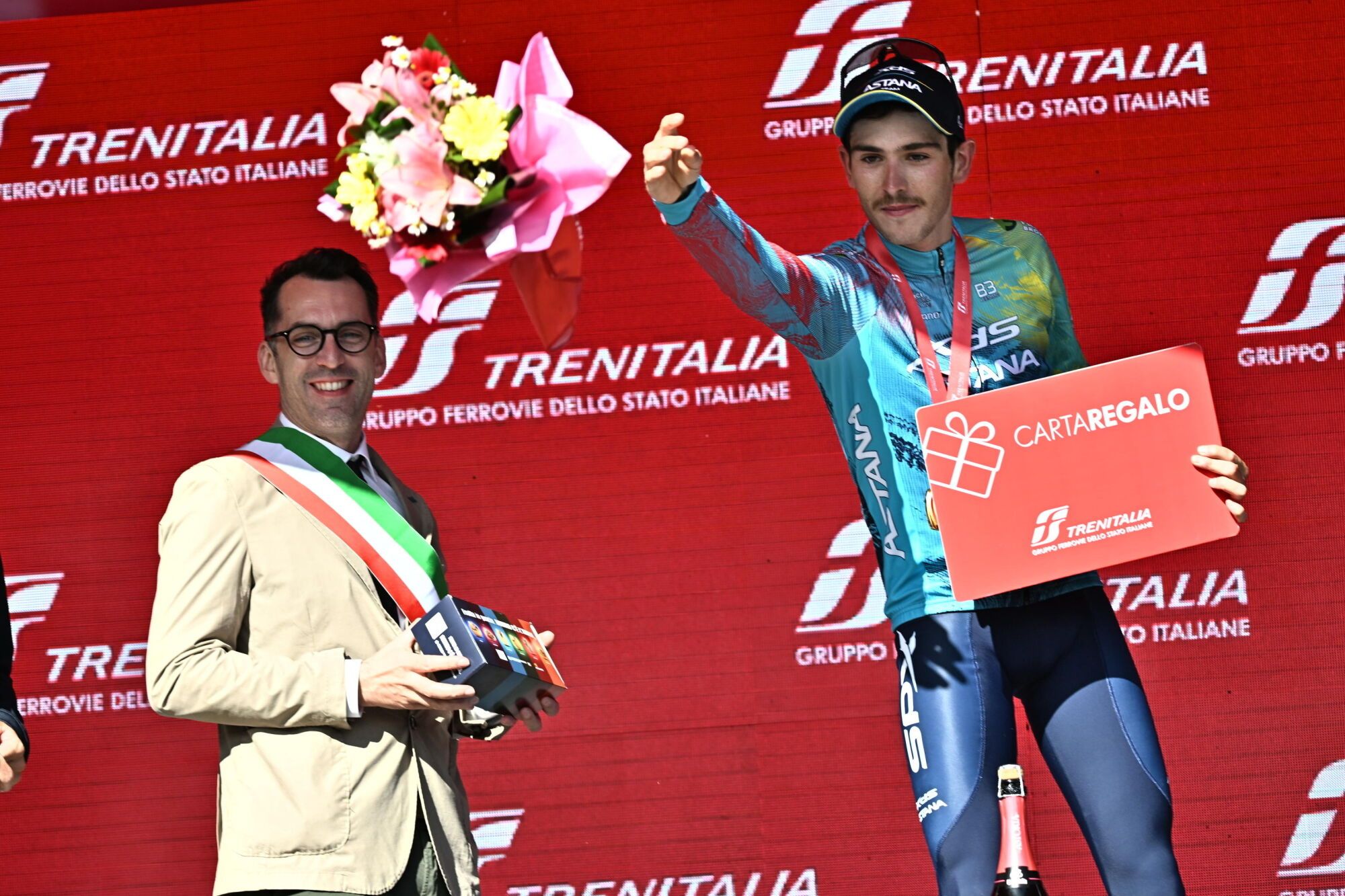 SAN VALENTINO (Italy), 27/05/2025.- Italian rider Christian Scaroni of XDS Astana Team celebrates on the podium after winning the 16th stage of the 108 Giro d'Italia 2025, cycling race over 203 km from Piazzola sul Brenta to San Valentino, Italy, 27 May 2025. (Ciclismo, Italia) EFE/EPA/LUCA ZENNARO