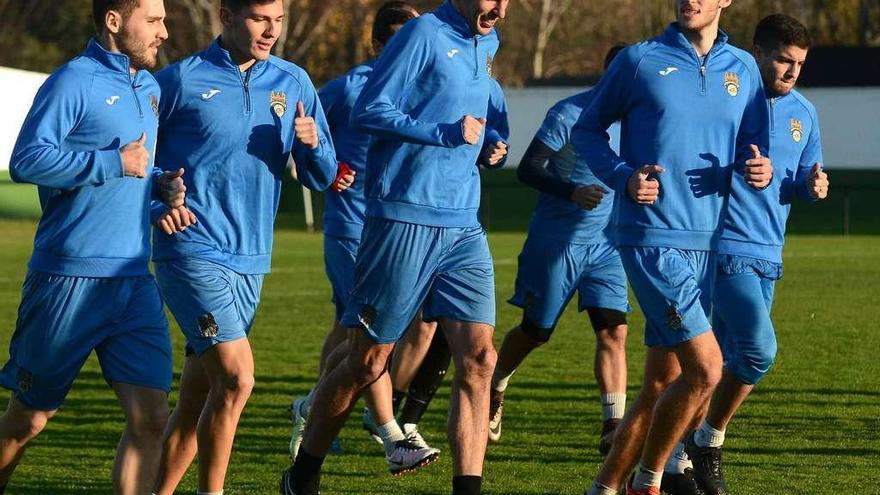 Añón, Miguel, Capi, Bruno y Adrián Gómez en un entrenamiento del equipo en A Seca. // Rafa Vázquez