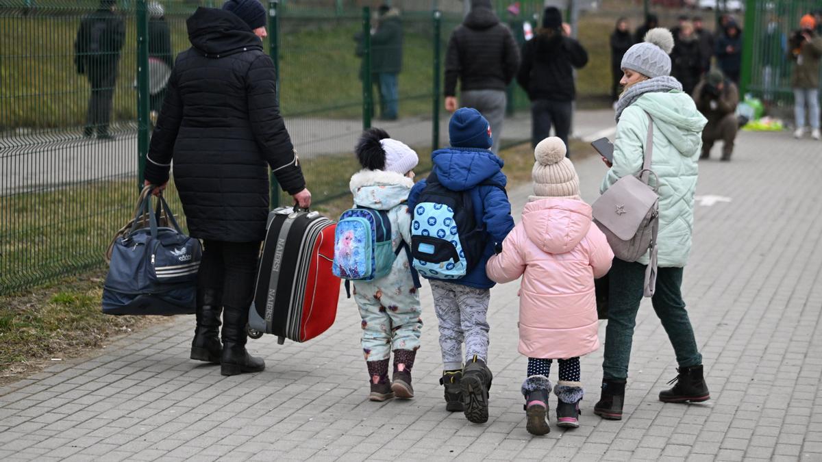 Refugiados ucranianos en la frontera con Polonia.