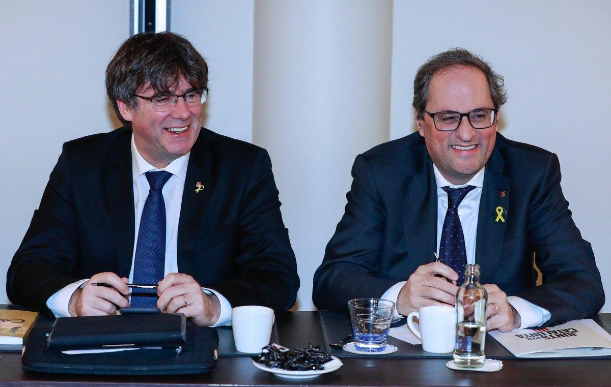 Carles Puigdemont y Quim Torra durante una reunión de JxCat en Bruselas, el pasado 21 de enero.