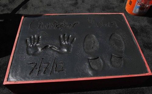 Director Nolan's signature, handprints and footprints in cement are pictured after the ceremony in Hollywood