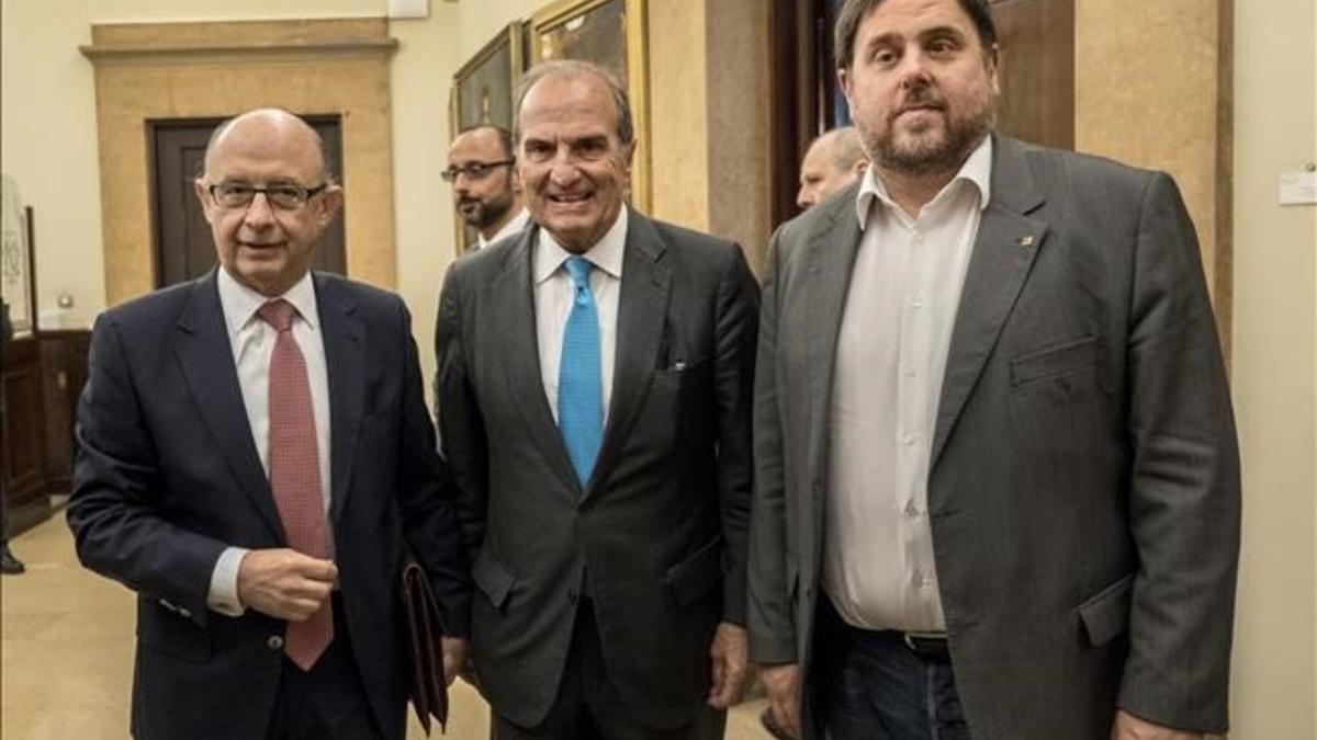 Cristobal  Montoro con Oriol Junqueras