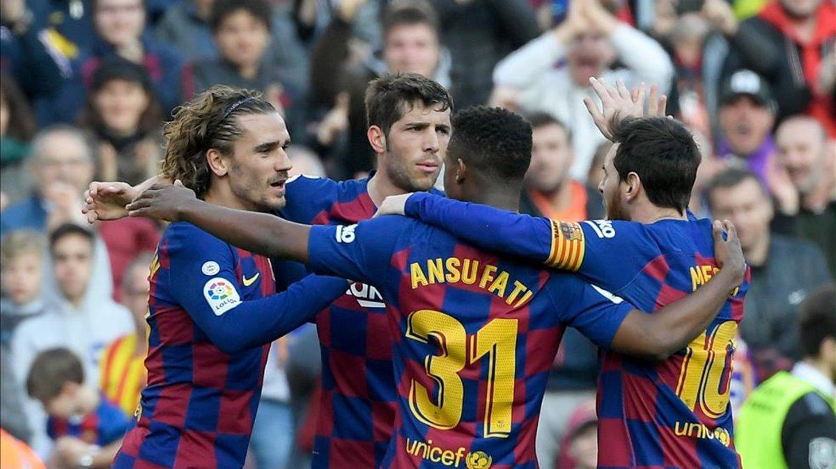 Griezmann celebra su gol con los compañeros